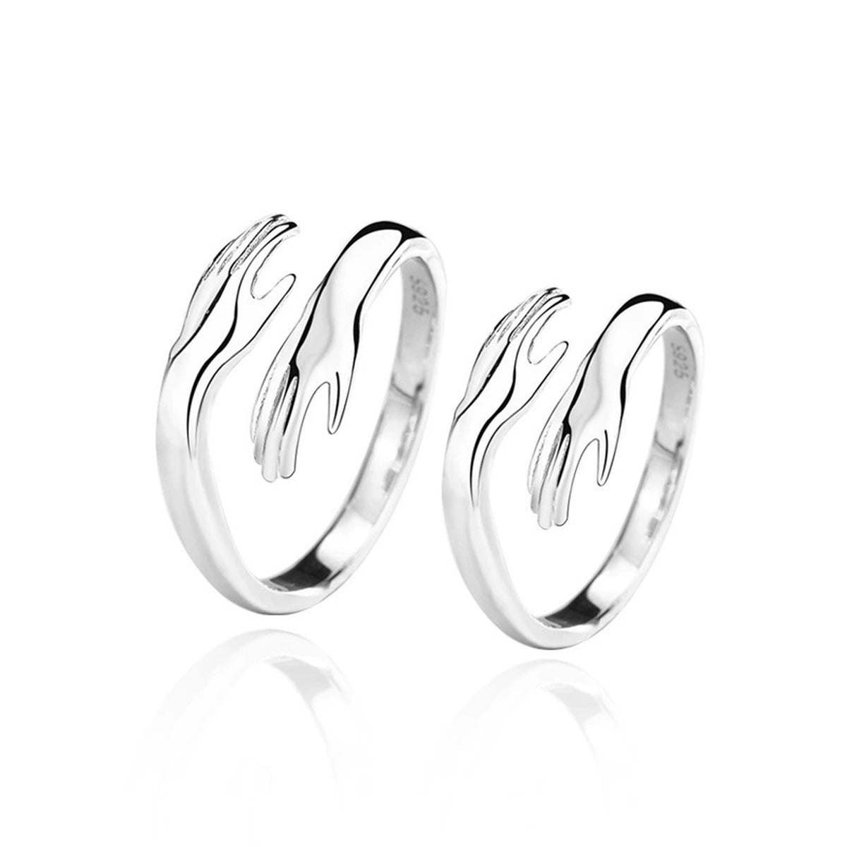 Embrace Motif Couples Adjustable Rings in white gold-plated S925 sterling silver on clean white background