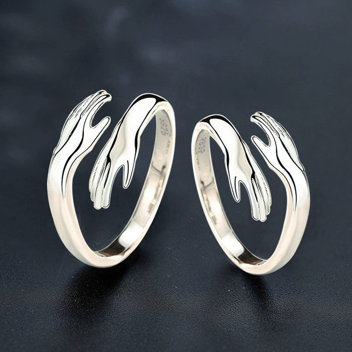 Embrace Motif Couples Adjustable Rings close-up detail view with moissanite sparkle
