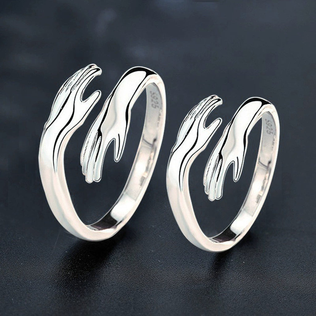 Embrace Motif Couples Adjustable Rings close-up detail view with moissanite sparkle