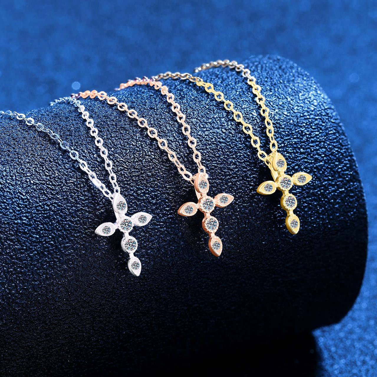 Platinum, rose gold, and 18K yellow gold plated moissanite cross necklaces