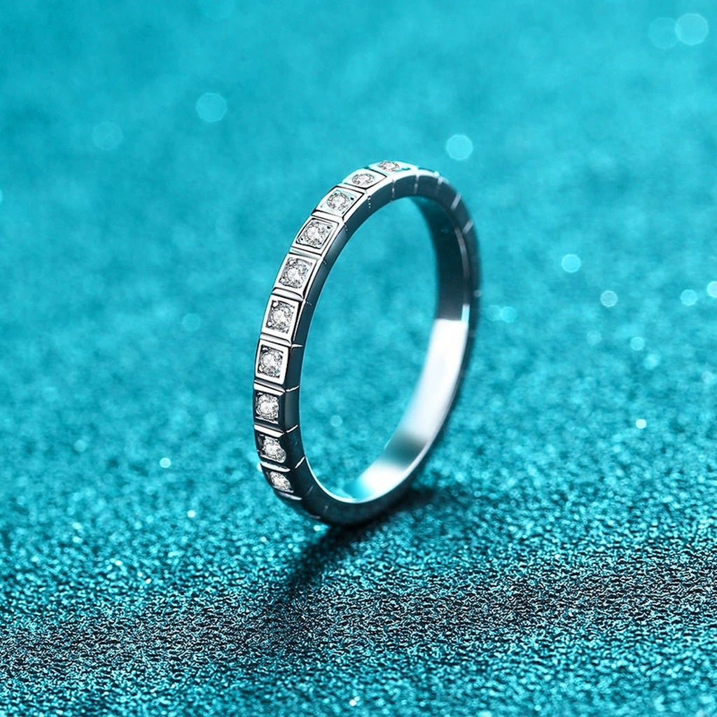 Round Moissanite Eternity Band Ring product view showing moissanite setting and metal finish