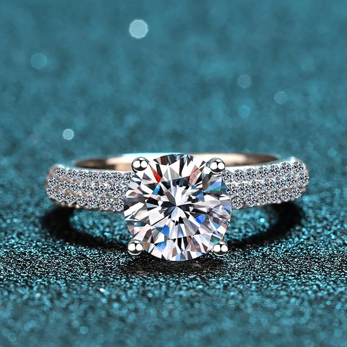 Round Moissanite Side Stone Engagement Ring with CZ product view showing moissanite setting and metal finish