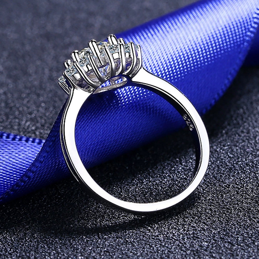 Round Moissanite Side Stone Engagement Ring with CZ product view showing moissanite setting and metal finish