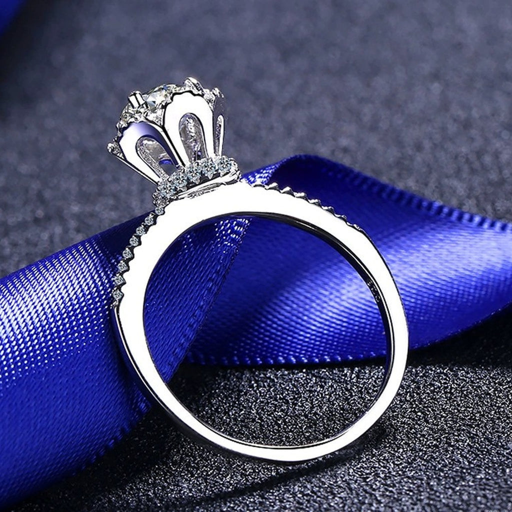 Round Moissanite Side Stone Ring with CZ product view showing moissanite setting and metal finish