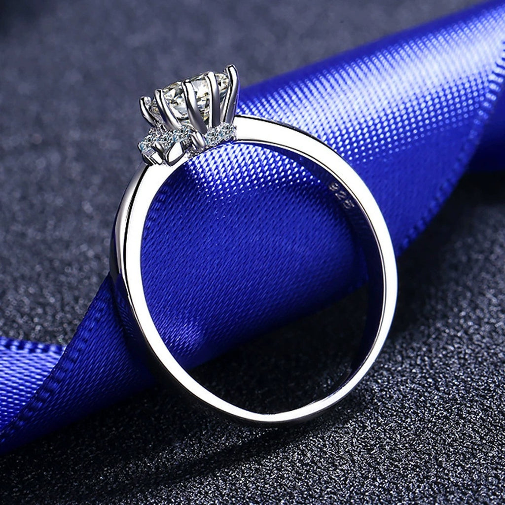 Round Moissanite Side Stone Ring with CZ product view showing moissanite setting and metal finish