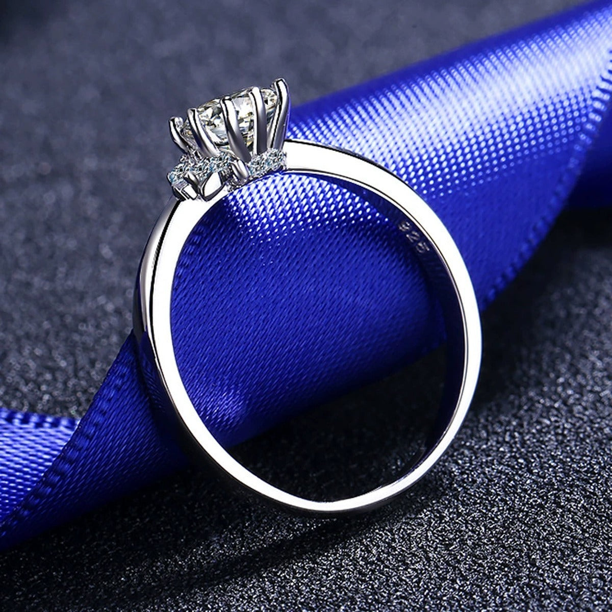 Round Moissanite Side Stone Ring with CZ product view showing moissanite setting and metal finish