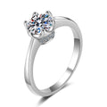 Round Moissanite Solitaire Ring with CZ in rhodium-plated S925 sterling silver on clean white background