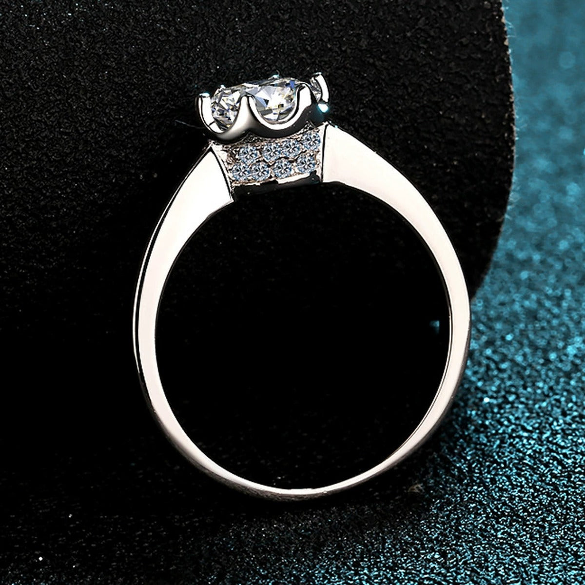 Round Moissanite Solitaire Ring with CZ product view showing moissanite setting and metal finish