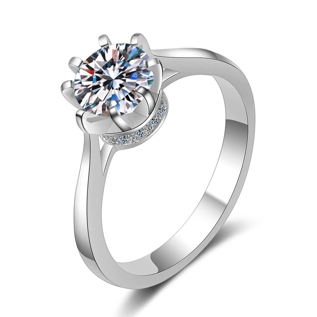 Round Moissanite Side Stone Ring with CZ in rhodium-plated S925 sterling silver on clean white background