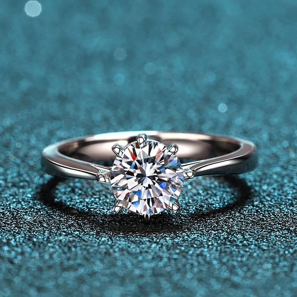 Round Moissanite Side Stone Ring with CZ product view showing moissanite setting and metal finish