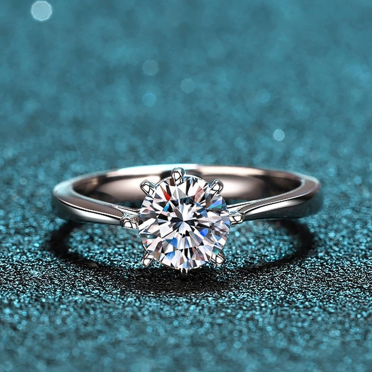 Round Moissanite Side Stone Ring with CZ product view showing moissanite setting and metal finish