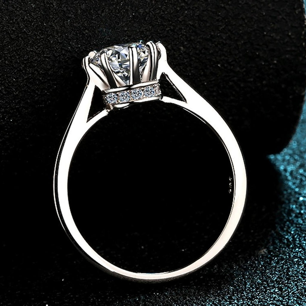 Round Moissanite Side Stone Ring with CZ product view showing moissanite setting and metal finish