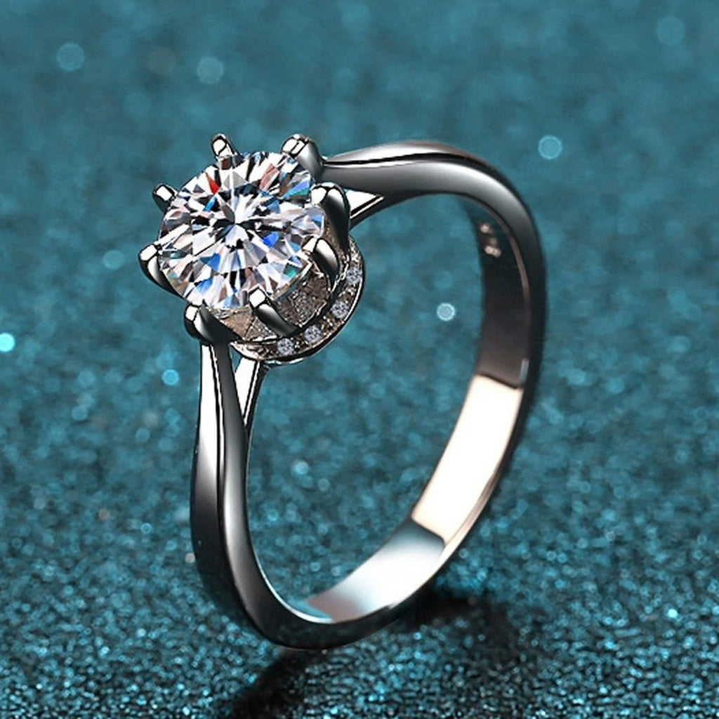 Round Moissanite Side Stone Ring with CZ product view showing moissanite setting and metal finish