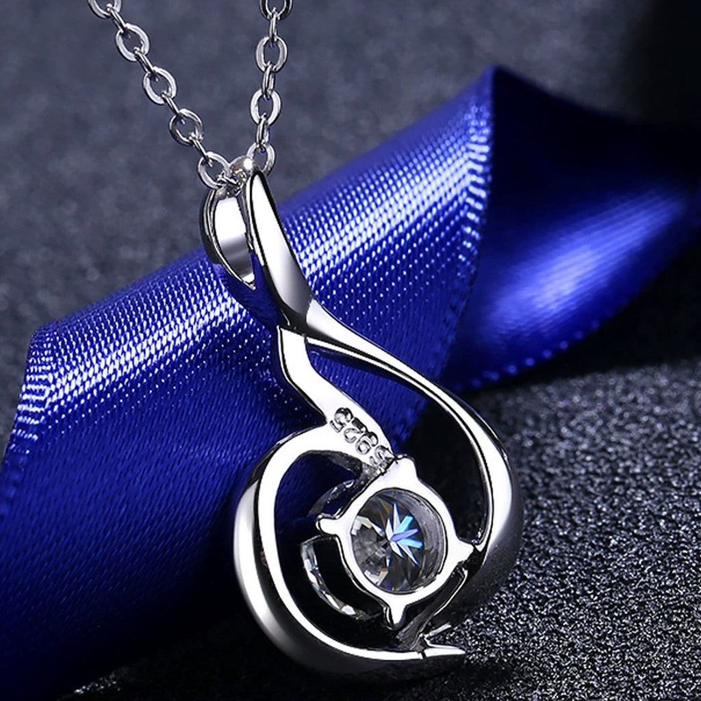 Swirl Moissanite Pendant Necklace in Rhodium-Plated S925 sterling silver product scene view showing chain and setting detail