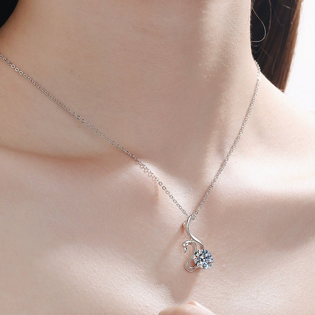 Cat Moissanite Pendant Necklace in Rhodium-Plated S925 sterling silver worn on neckline by model showing scale and adjustable chain styling