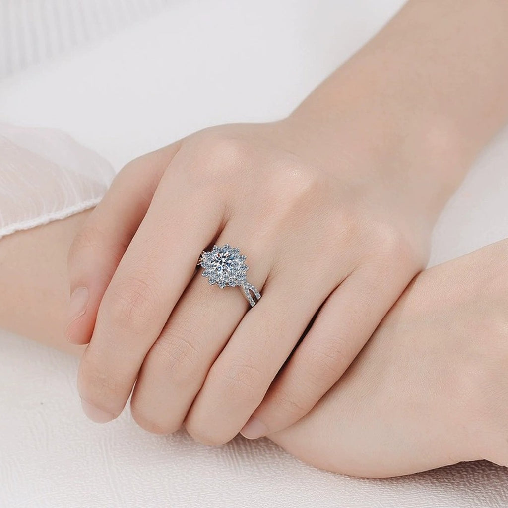 Floral Moissanite Halo Engagement Ring with CZ worn on hand to show scale, band width, and ring profile