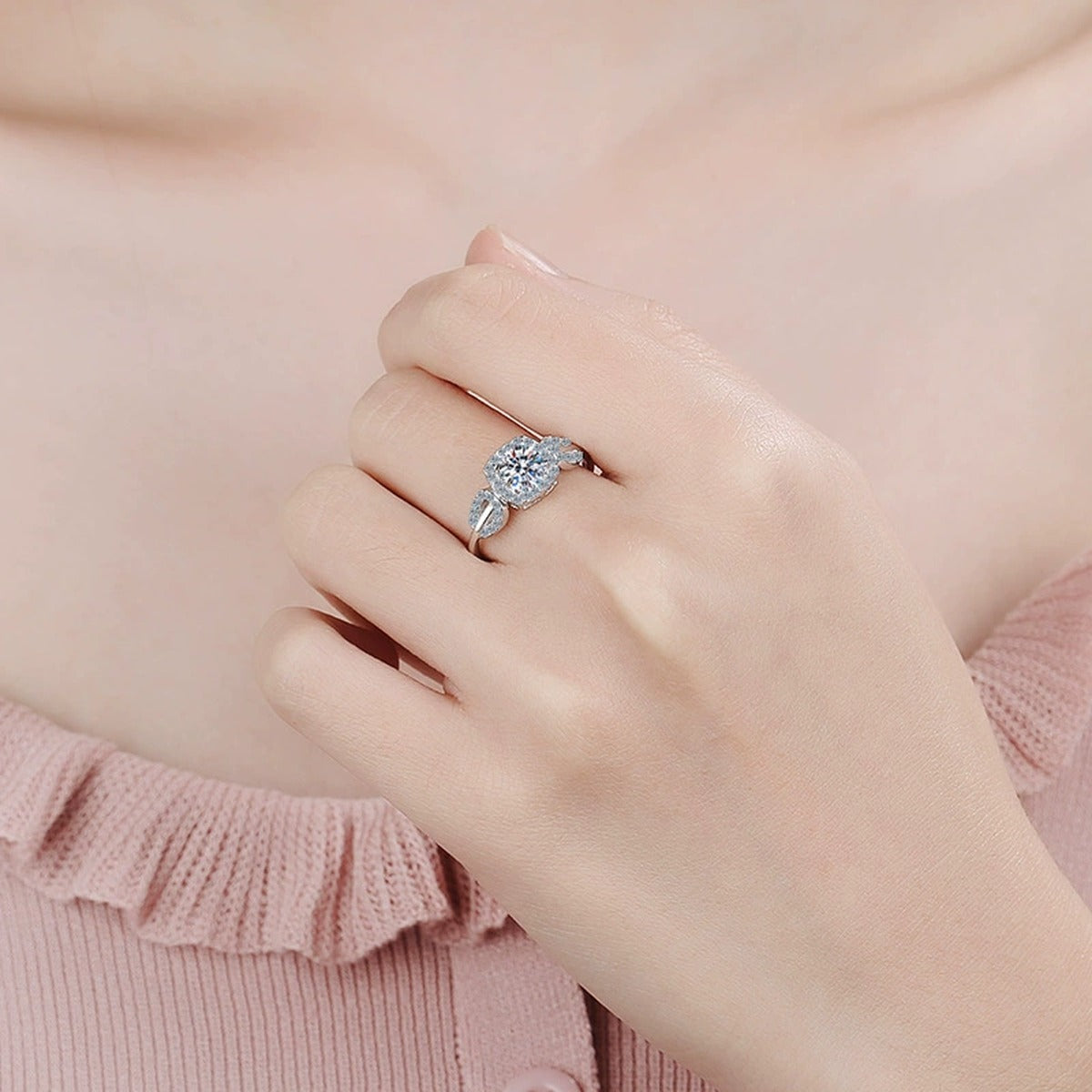 Round Moissanite Halo Engagement Ring with CZ worn on hand to show scale, band width, and ring profile