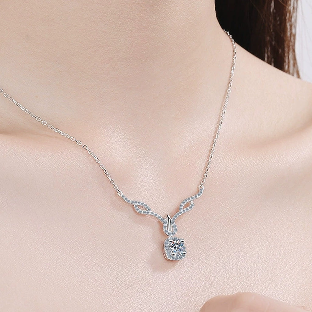 Angel Wing Cushion Moissanite Pendant Necklace with CZ in Rhodium-Plated S925 sterling silver worn on neckline by model showing scale and adjustable chain styling