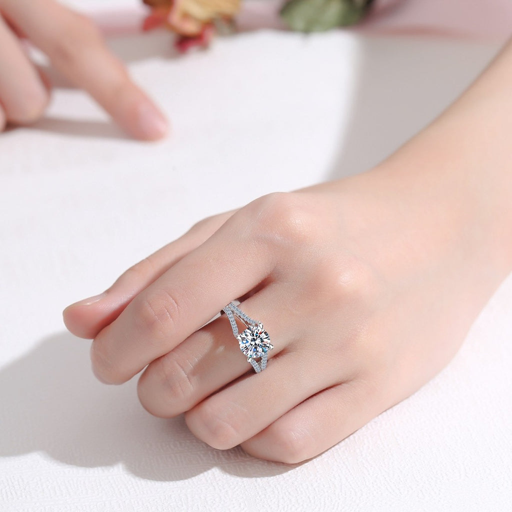 Round Moissanite Split Shank Engagement Ring with CZ worn on hand to show scale, band width, and ring profile