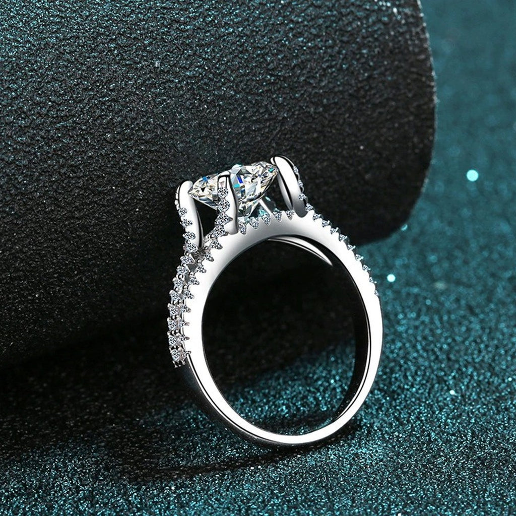 Round Moissanite Split Shank Engagement Ring with CZ product view showing moissanite setting and metal finish