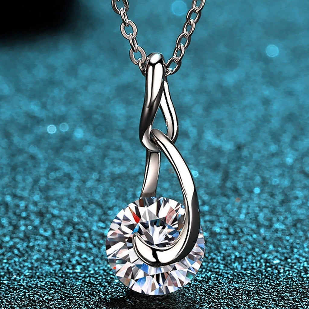 Water Drop Moissanite Pendant Necklace in Rhodium-Plated S925 sterling silver product scene view showing angled sparkle
