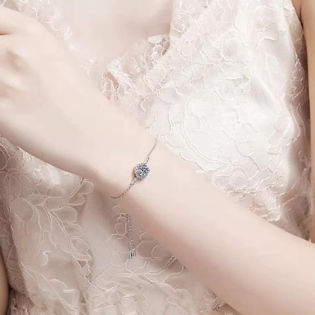 Round Halo Moissanite Adjustable Bracelet with CZ in Rhodium-Plated S925 sterling silver worn on wrist model view showing scale and adjustable fit