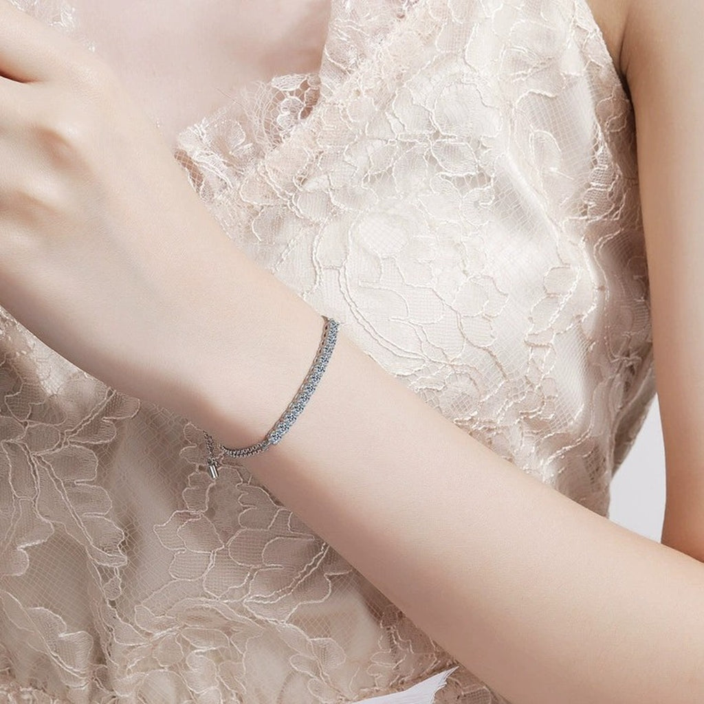 Mini Tennis Moissanite Adjustable Bracelet in Rhodium-Plated S925 sterling silver worn on wrist model view showing scale and adjustable fit