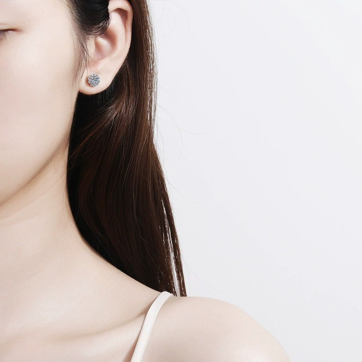 Floral Halo Moissanite Stud Earrings with CZ in Rhodium-Plated S925 Sterling Silver worn on ear by model to show scale, drop length, and everyday styling