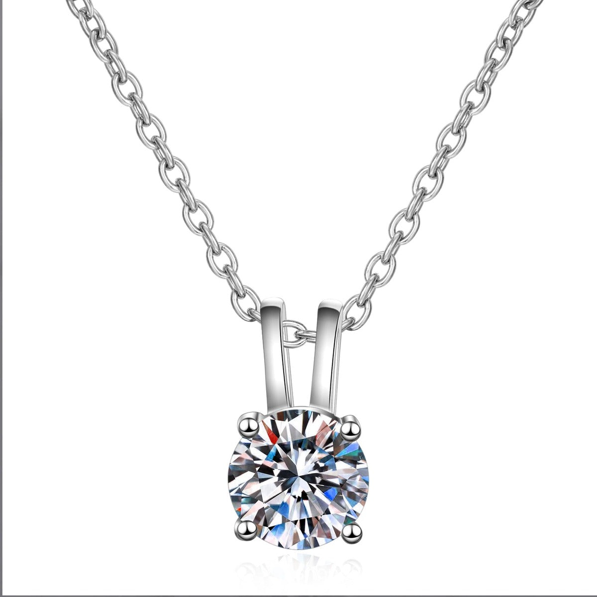 Solitaire Moissanite Pendant Necklace in Rhodium-Plated S925 sterling silver on white background showing pendant shape and round moissanite