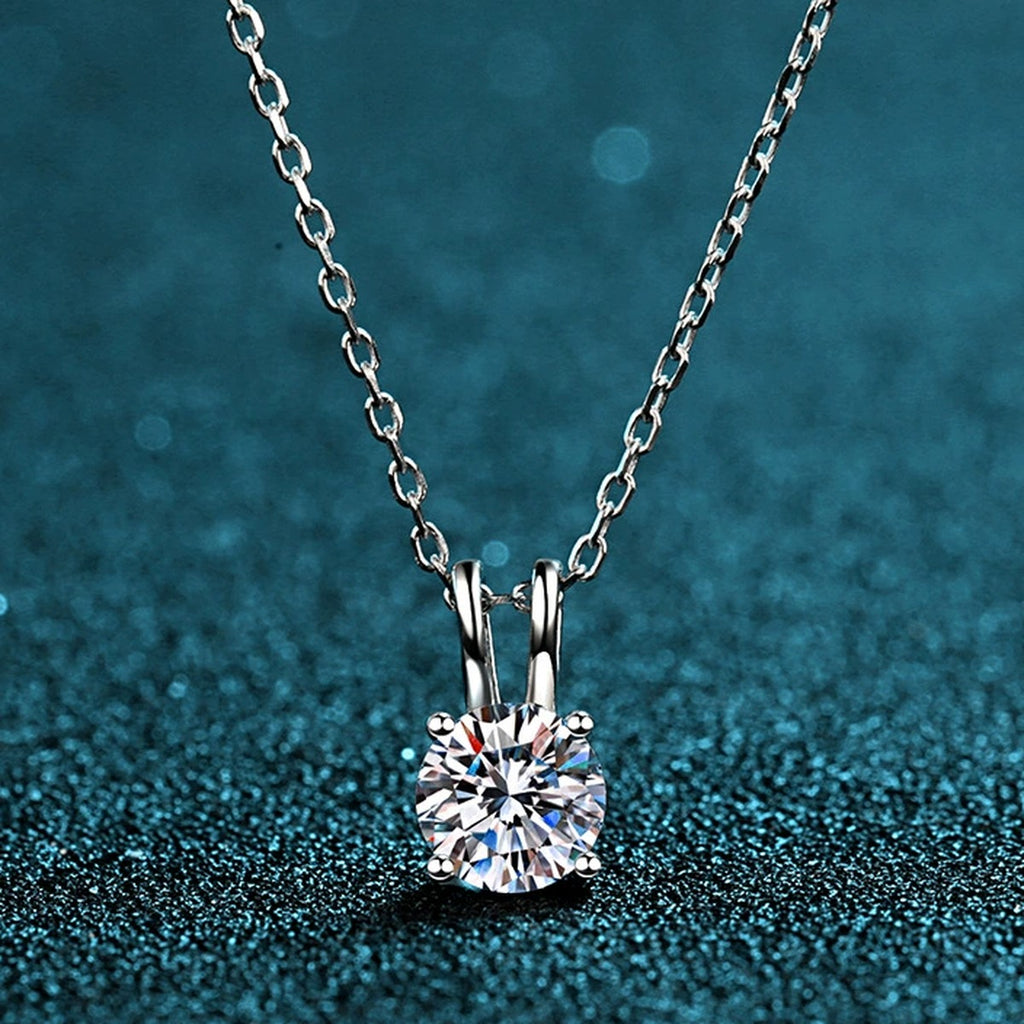 Solitaire Moissanite Pendant Necklace in Rhodium-Plated S925 sterling silver product scene view showing chain and setting detail