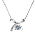 Ribbon Bow Moissanite Pendant Necklace with CZ in Rhodium-Plated S925 sterling silver on white background showing pendant shape and round moissanite