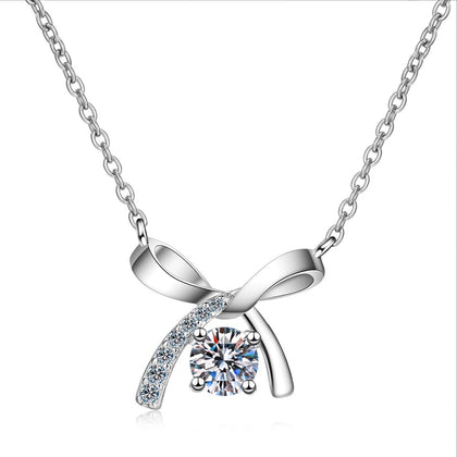 Ribbon Bow Moissanite Pendant Necklace with CZ in Rhodium-Plated S925 sterling silver on white background showing pendant shape and round moissanite