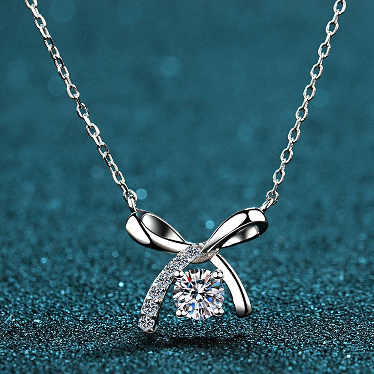 Ribbon Bow Moissanite Pendant Necklace with CZ in Rhodium-Plated S925 sterling silver product scene view showing pendant detail