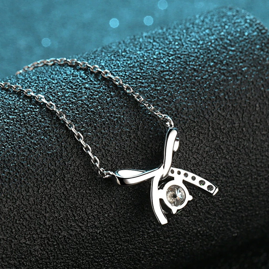 Ribbon Bow Moissanite Pendant Necklace with CZ in Rhodium-Plated S925 sterling silver product scene view showing chain and setting detail