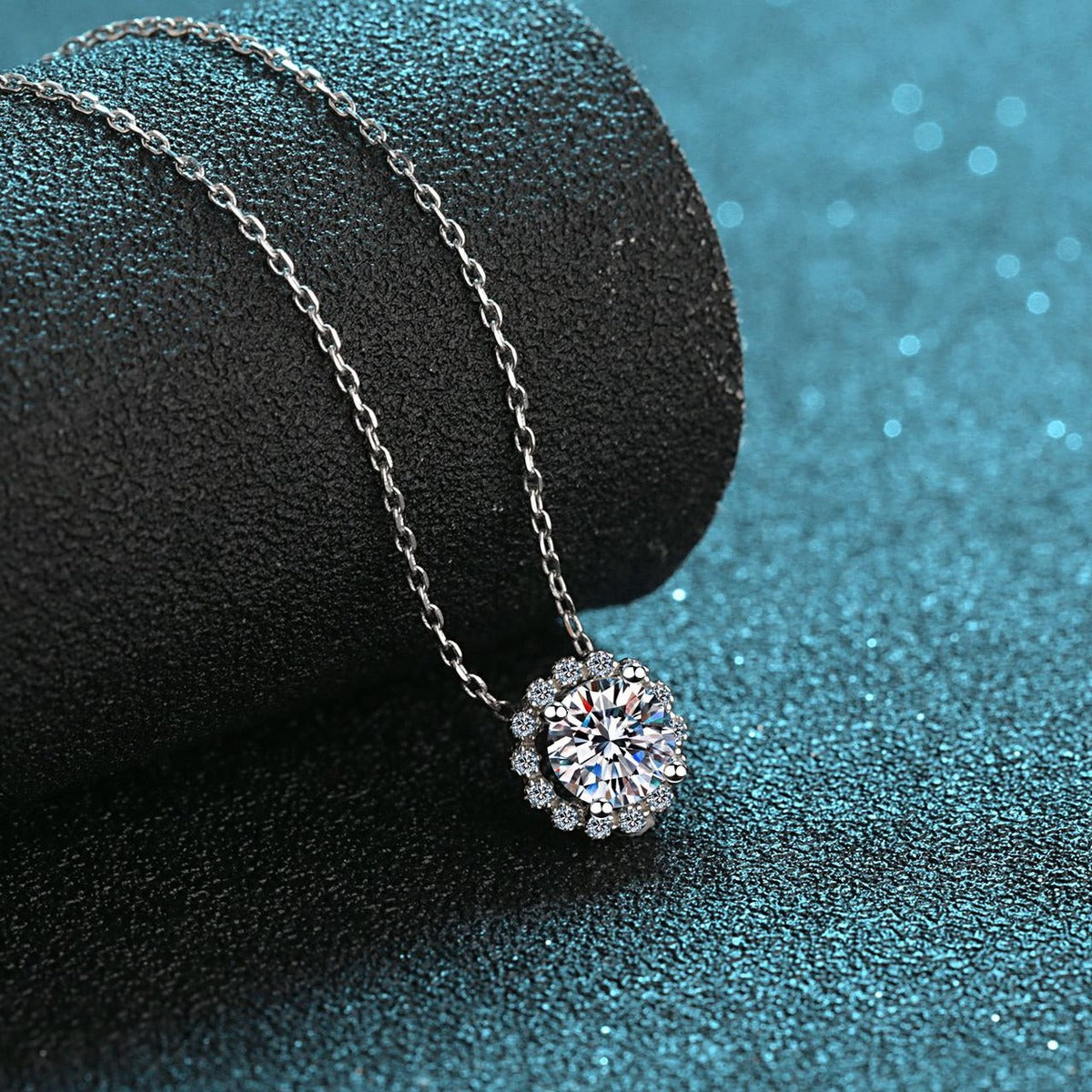 Round Halo Moissanite Pendant Necklace with CZ in Rhodium-Plated S925 sterling silver blue display scene showing chain and stone layout