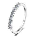 Round Moissanite Stackable Band Ring in rhodium-plated S925 sterling silver on clean white background