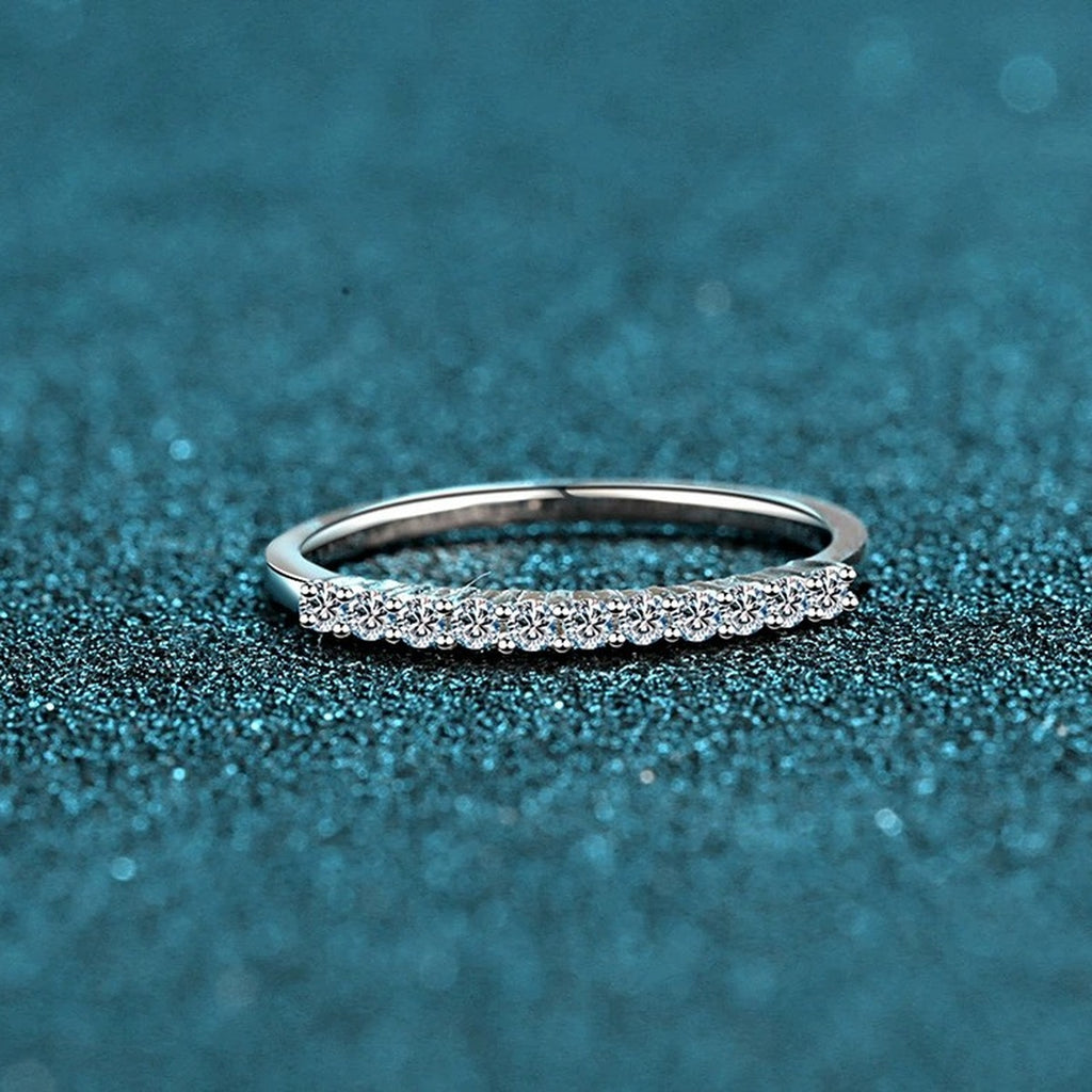 Round Moissanite Stackable Band Ring product view showing moissanite setting and metal finish