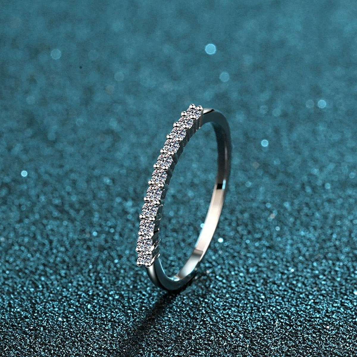 Round Moissanite Stackable Band Ring product view showing moissanite setting and metal finish