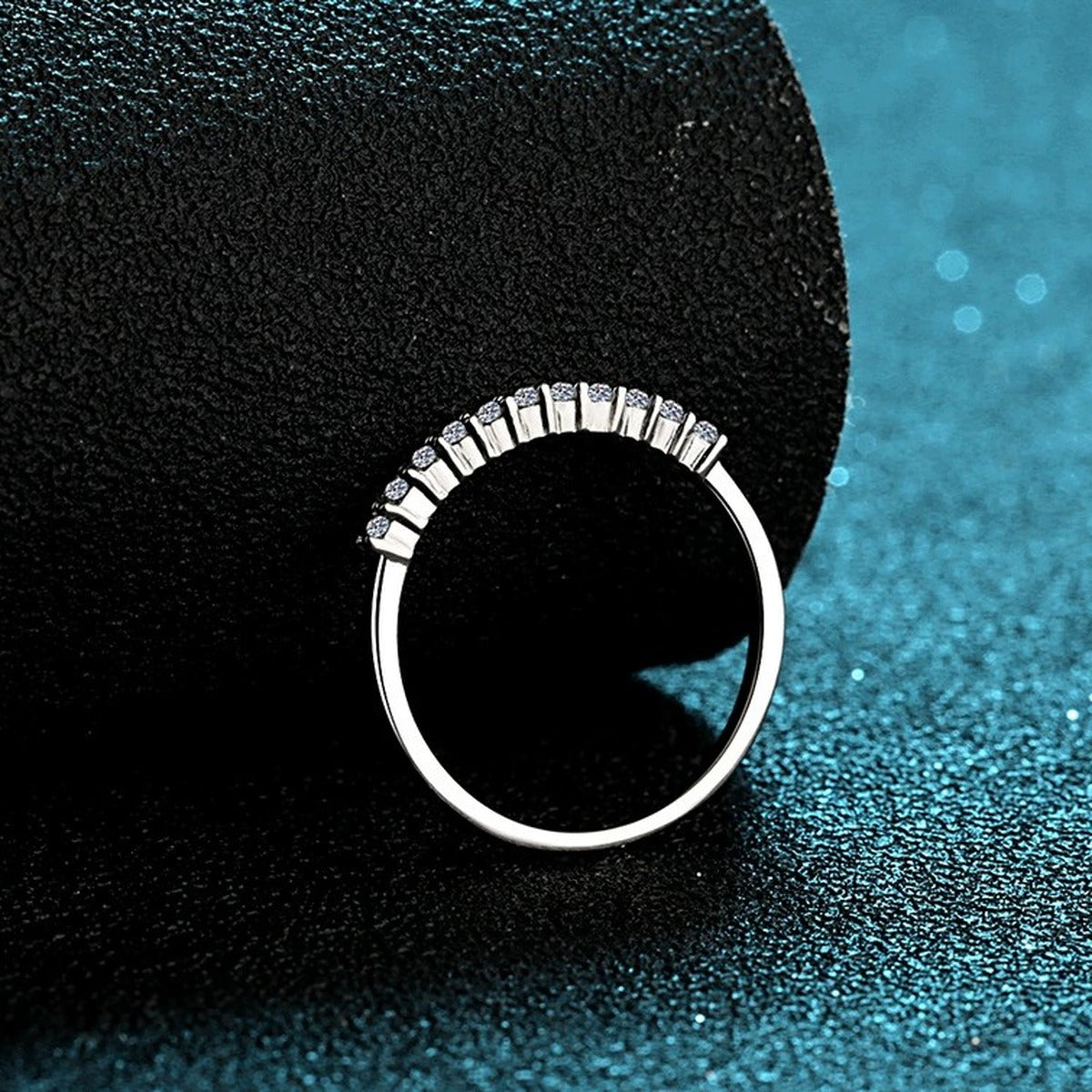 Round Moissanite Stackable Band Ring product view showing moissanite setting and metal finish