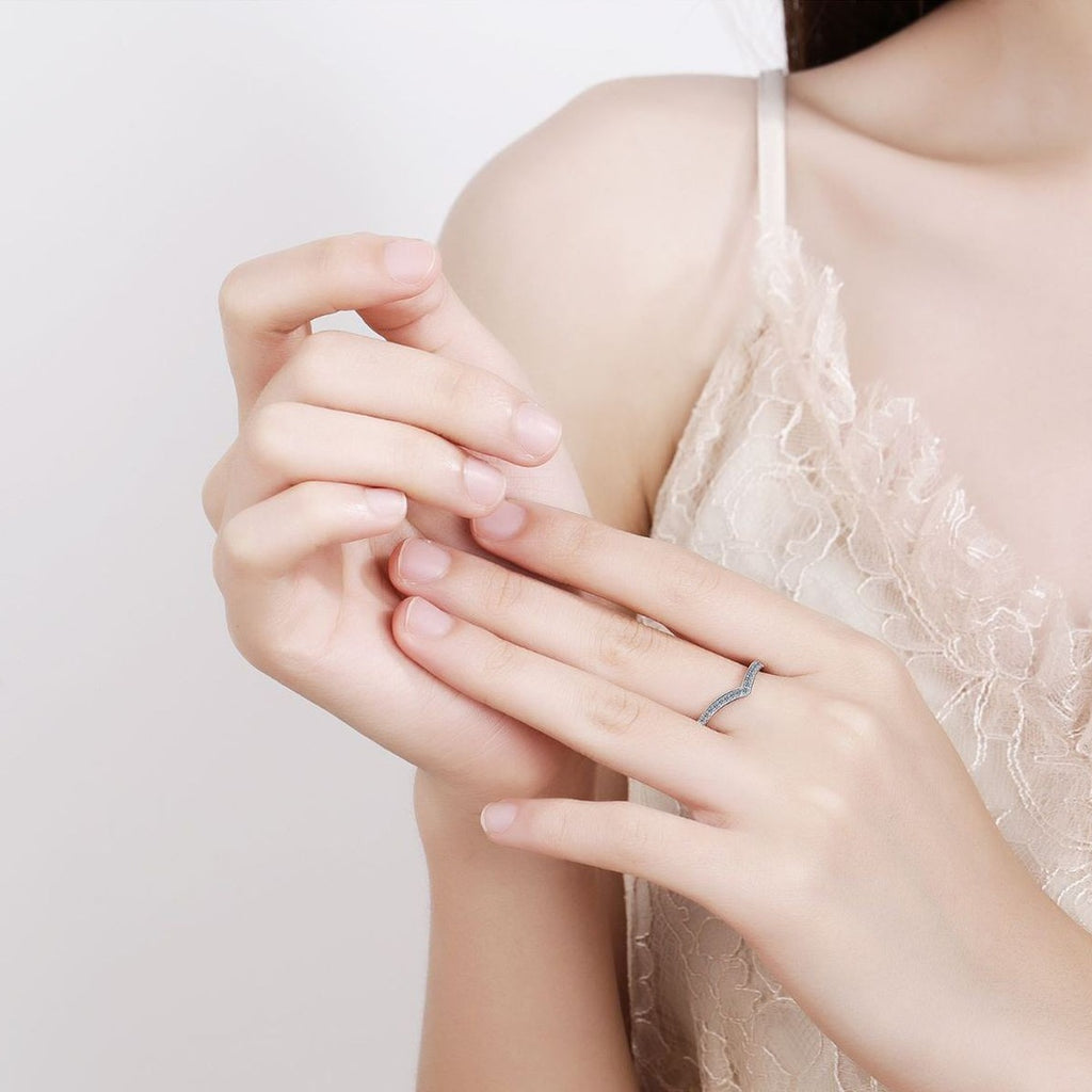 Slim Moissanite Band Ring in Rhodium-Plated S925 Sterling Silver worn on hand, showing scale, finger coverage, and rhodium-plated finish