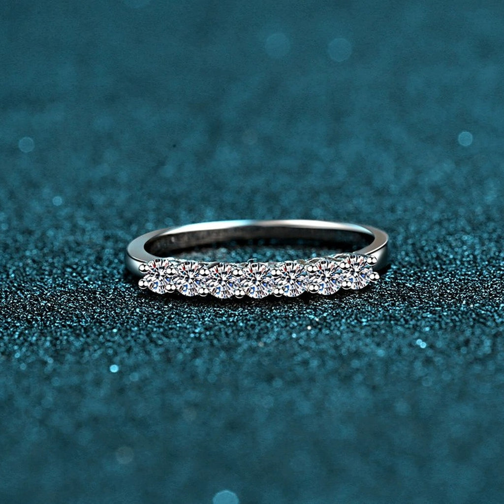 Curved Pave Moissanite Band Ring in Rhodium-Plated S925 Sterling Silver blue display product photo showing the moissanite setting and band profile