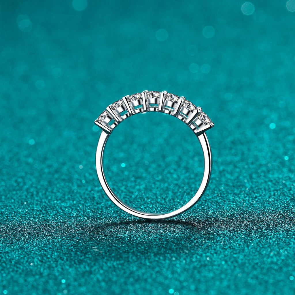 Curved Pave Moissanite Band Ring in Rhodium-Plated S925 Sterling Silver blue display product photo showing the moissanite setting and band profile