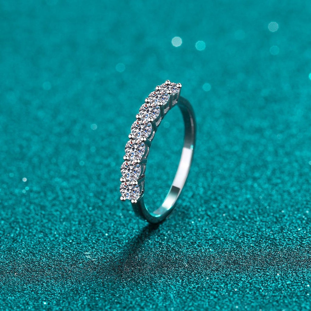 Curved Pave Moissanite Band Ring in Rhodium-Plated S925 Sterling Silver blue display product photo showing the moissanite setting and band profile