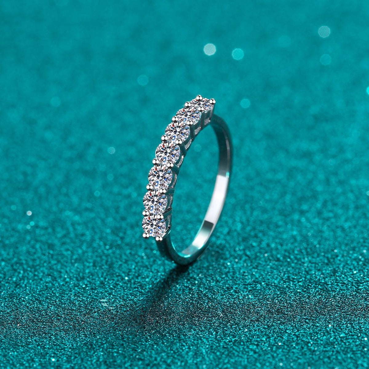 Curved Pave Moissanite Band Ring in Rhodium-Plated S925 Sterling Silver blue display product photo showing the moissanite setting and band profile