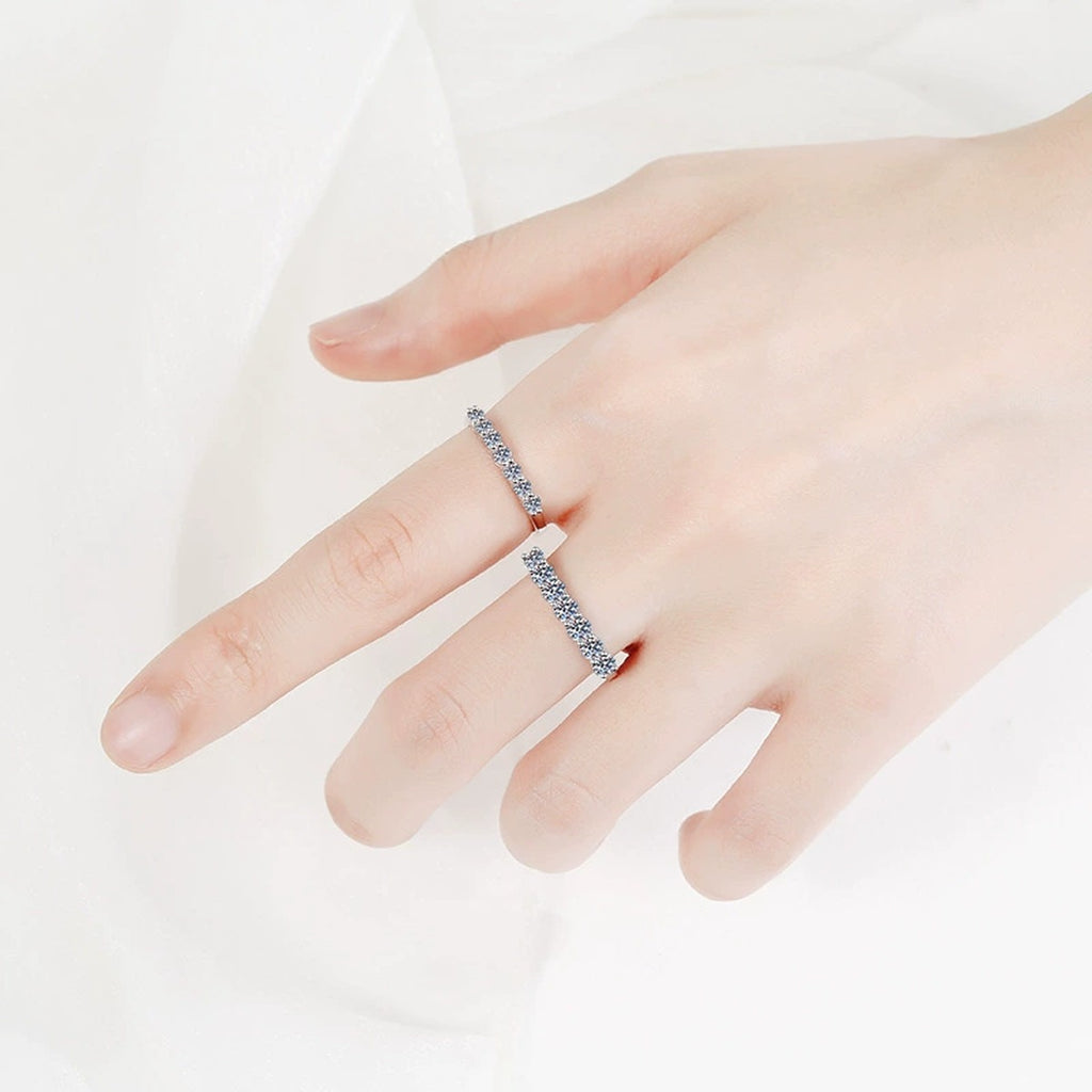 Curved Pave Moissanite Band Ring in Rhodium-Plated S925 Sterling Silver studio product angle showing the ring setting, stone detail, and band design