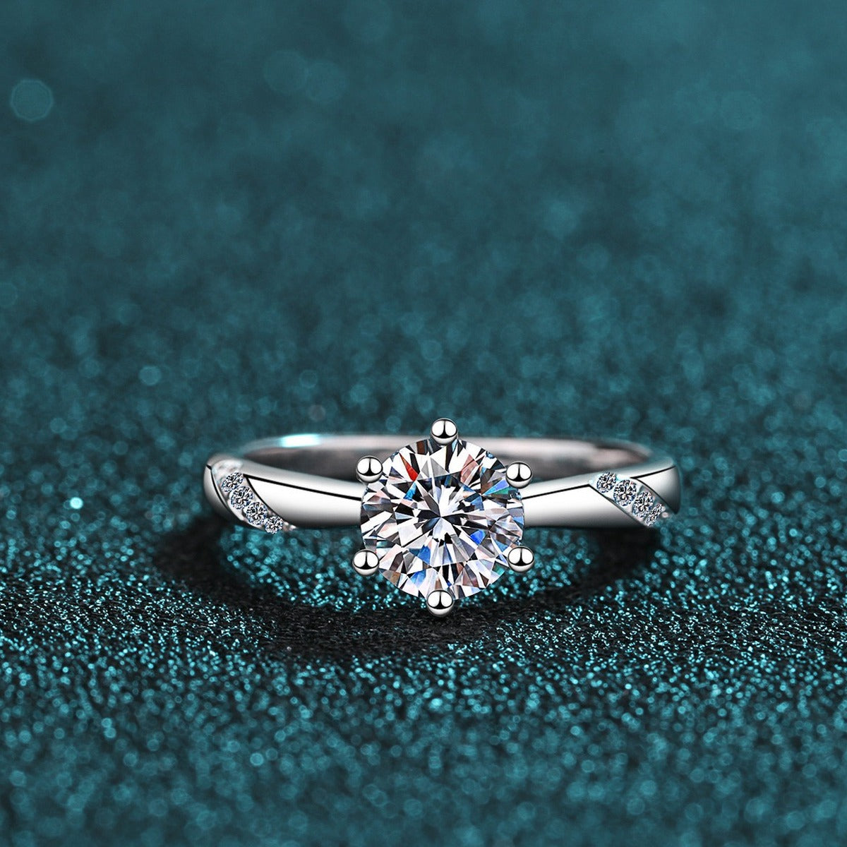 Round Moissanite Solitaire Ring in Rhodium-Plated S925 Sterling Silver blue display product photo showing the moissanite setting and band profile