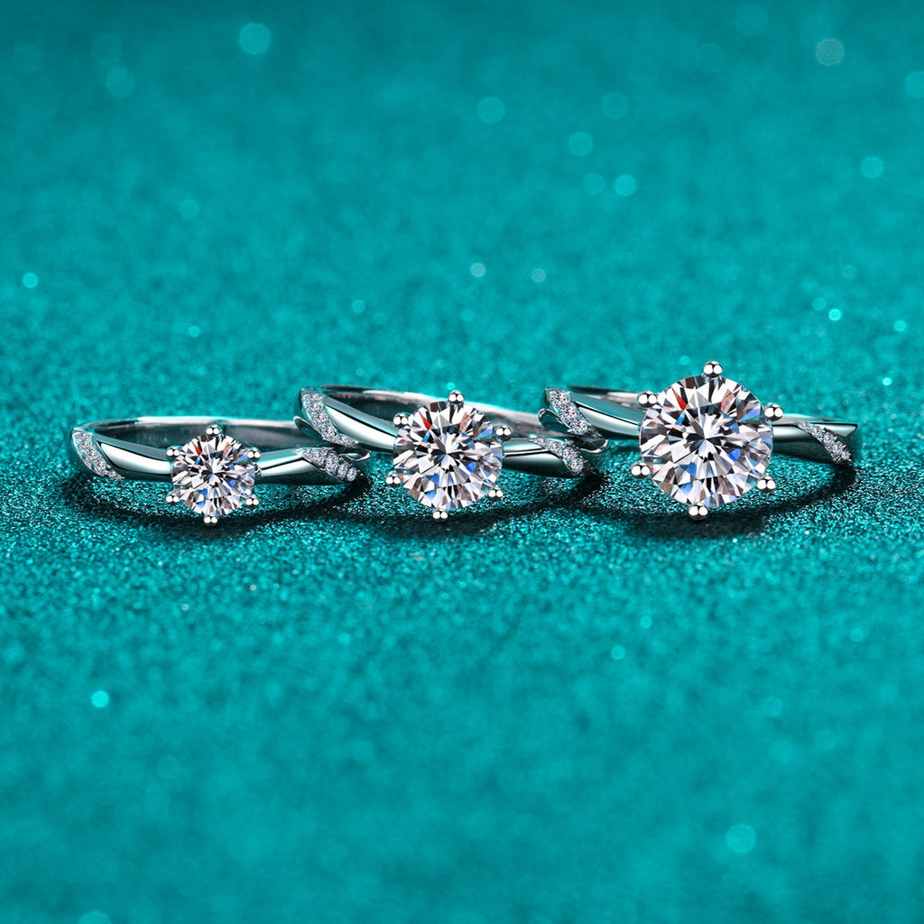 Round Moissanite Solitaire Ring in Rhodium-Plated S925 Sterling Silver blue display product photo showing the moissanite setting and band profile