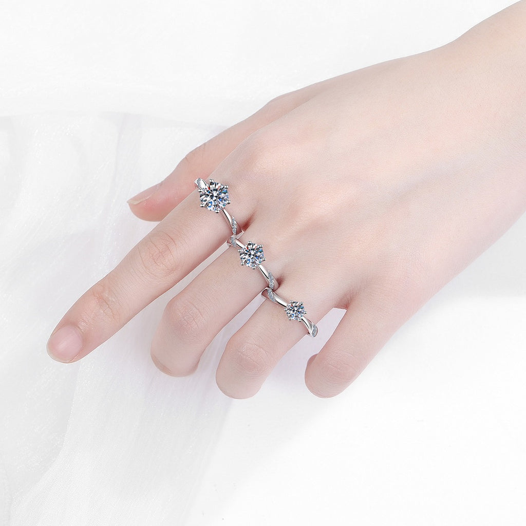 Round Moissanite Solitaire Ring in Rhodium-Plated S925 Sterling Silver studio product angle showing the ring setting, stone detail, and band design