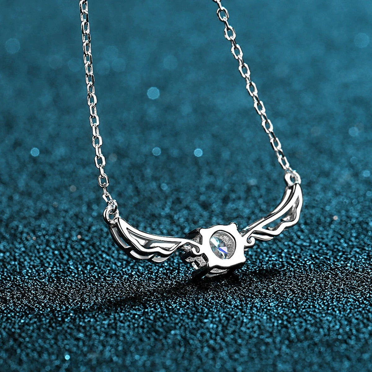 Angel Wing Moissanite Pendant Necklace in Rhodium-Plated S925 sterling silver product scene view showing pendant detail