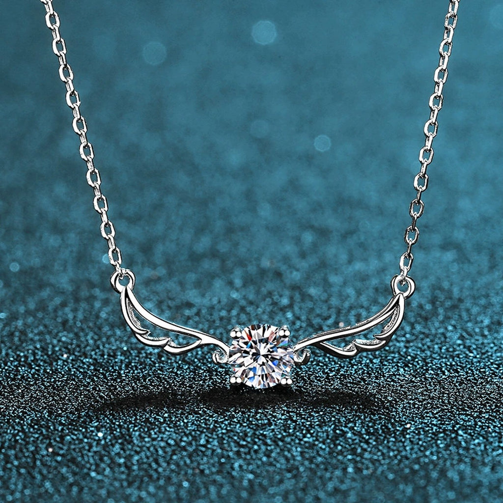 Angel Wing Moissanite Pendant Necklace in Rhodium-Plated S925 sterling silver product scene view showing angled sparkle
